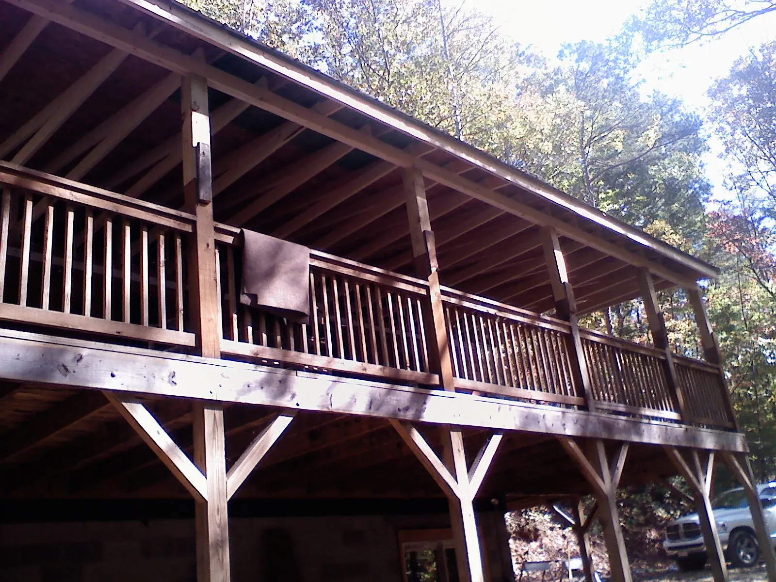 Timber framing under a new elevated porch and deck — Roof Leak Repair in Rawlins by Roofing Brothers